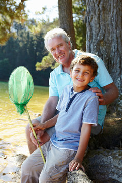 Man and boy fishing together