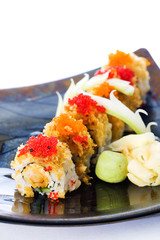 Red and Orange Fish Eggs on Sushi Rolls