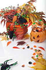 Naklejka premium Halloween candy and pumpkins