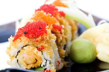 Fish eggs on a crunchy sushi roll