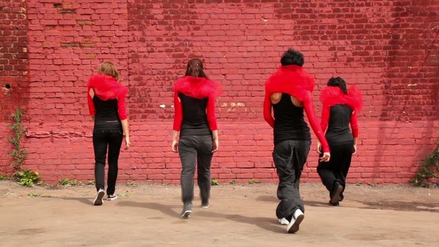 Dance team dance synchronously in modern style