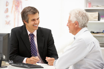 Doctor with senior patient