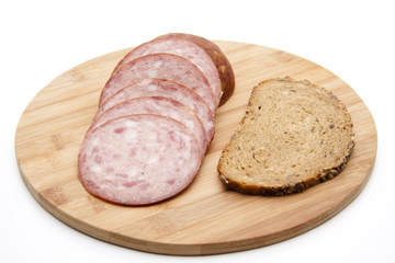 Presskopf mit Brot auf Holzteller