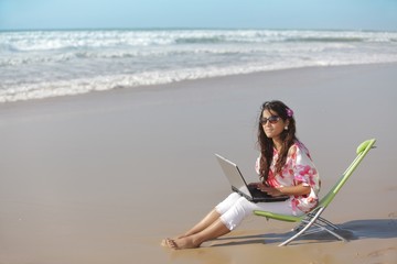 Fototapeta premium woman and laptop at sea