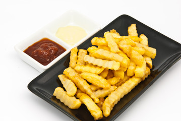 French fries in black plate