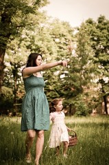 Mother with her child having great time outdoors