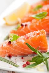Fresh salmon with sea salt, pink pepper,rosemary and basil