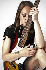 Obraz na płótnie Canvas Girl on rock guitar