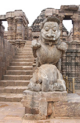 Fototapeta na wymiar Beautiful carved Giant lion at the entrance of sun temple