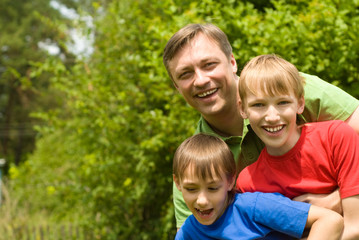 dad with sons at nature