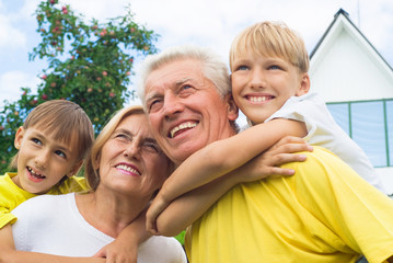 family of a four outdoors