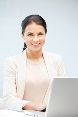 happy woman with laptop computer