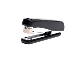 black stepler on white