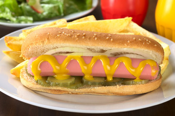 Hotdog with pickles, onion and mustard