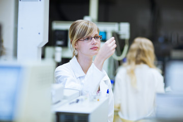 portrait of a female researcher/chemistry student carrying out r