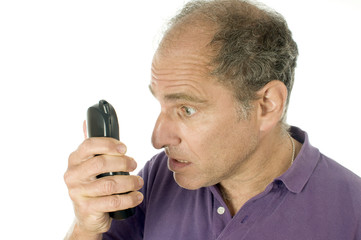 Naklejka premium senior man telephone angry emotion unbelievable