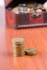 Open chest with coins