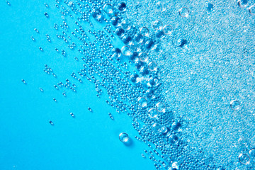 crystal glass pearls little balls texture on blue