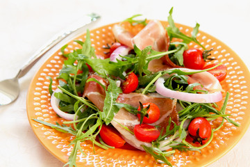 Prosciutto with rocket salad