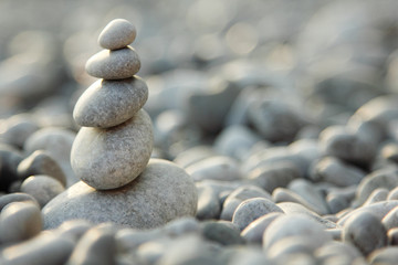 balanced stones over nature background