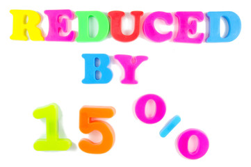 reduced by 15% written in fridge magnets