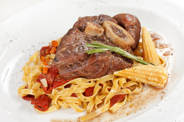 tasty steak with pasta