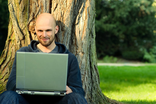 Young man with notebook