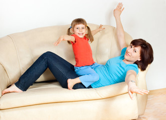 Woman playing with baby.