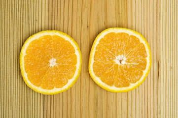 Orange on wood background