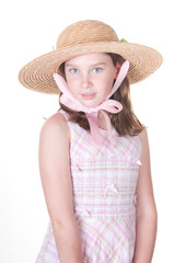 Girl in dress and hat