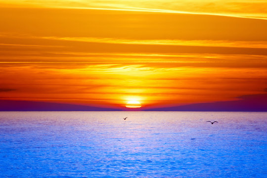 Fototapeta Sunset over sea