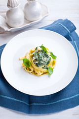 Tagliatelle with cream blue cheese sauce and spinach