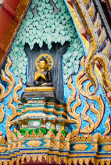 Buddha on triangle of buddhist temple