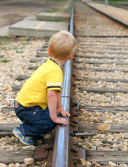 Boy playing on track