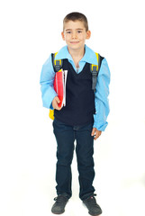 Happy schoolboy with notebooks