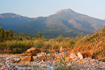 illegal garbage dump in countryside