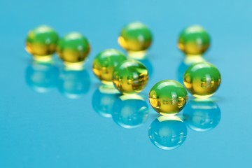 Macro of E vitamines on blue