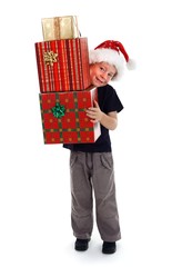 Smiling boy holding presents