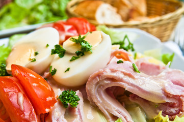 Delicious fresh salad and olive oil