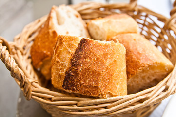 bread in basket - little roll breads in basket on table