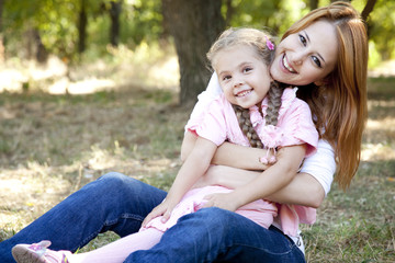 Mother and daughter at the park.