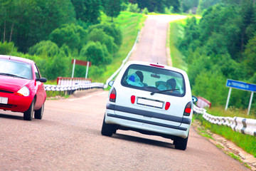 Fototapeta premium Cars on a dangerous bend