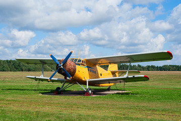 Antonov An-2 agricultural plane stands in the field