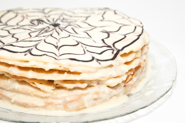 Napoleon cake decorated with chocolate pattern