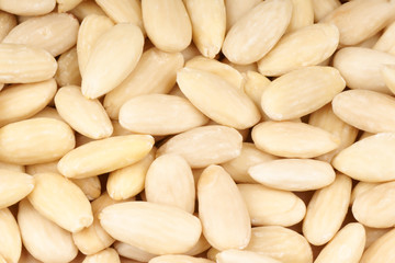 Peeled sweet almonds background