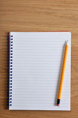 Blank notepad and pencil