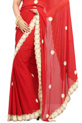Fototapeta na wymiar young woman draped in red color wedding saree,India