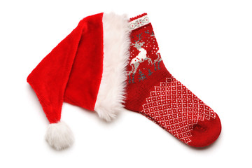 Obraz na płótnie Canvas Christmas stocking and Santa hat