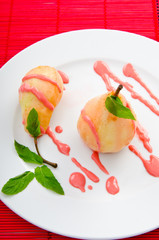 Dessert with pear in sauce