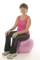 woman exercising core training fitness ball